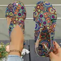Detailed view of colorful ethnic mandala print on flat bohemian sandals - Blue Floral