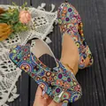Detailed view of colorful ethnic print flat sandals featuring vibrant bohemian patterns - 36 / Blue Floral