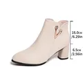 Detail view of cream ankle boots with rhinestone accents and 6.5cm block heel - 35 / Off White