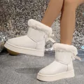 Elegant cream white snow boots featuring plush faux fur trim and chic bow detail on a thick sole - 36 / White