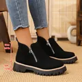 Stylish black suede ankle boots with side zipper, thick lugged sole, and 5cm block heel. - 36 / Black