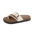 Close-up detail of beige women's platform slide sandal with gold buckle - 36 / White