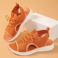 Detail view of orange flyknit sporty sandals with thick white soles for women. - 36 / Orange
