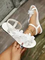 Elegant white toe-loop flat sandals with three-dimensional floral lace embellishments - 36 / White