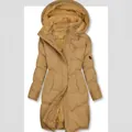 Gedetailleerd overzicht van de warme voering in deze lange winterparka met vaste kap - S / Tops / Aardgeel
