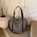 Grande borsa tote in tela grigia con spalline in pelle marrone per viaggi e ufficio - Grigio