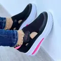 Comfortable women's breathable black knit platform sneakers with stylish pink accent - Black