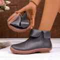 Flexible grey leather ankle boots showing sole softness and white stitching details - 35 / Gray