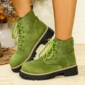 Detailed macro shot of green suede lace-up platform Martin boots with chunky soles - 36 / Fluorescent Green