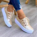 Elegant champagne gold women's platform sneakers with decorative gold studs and white soles - 35 / Gold