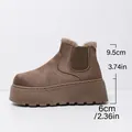 Brown platform suede snow boots with faux fur lining and height dimension labels. - 36 / Chestnut