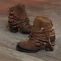 Close-up shot of vintage brown leather ankle boots with unique braided strap details - 35 / Brown