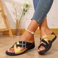 Fashionable women's wedge slippers with gold and black cross straps and metal buckle - Gold