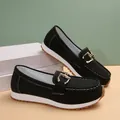 Chic black platform loafers for women featuring a stylish gold metal chain buckle - 36 / Black
