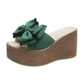 Stylish women's green wedge slippers featuring a large bow and woven platform sole - 34 / Green