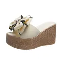 Elegant cream summer wedge slides featuring a large bow and woven straw platform sole - 34 / Off White