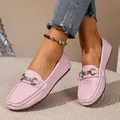Pink pebbled leather loafers for women with decorative metal buckle and soft sole for comfort. - Pink