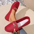 Comfortable red leather loafers for women with stylish metal butterfly buckle detail - Bright Red