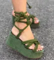 Close-up macro shot of green platform wedge sandals with lace-up rope ankle straps - 35 / Green