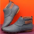Comfortable soft blue leather flat ankle boots for women featuring brown velcro strap detail - 35 / Dark Gray