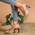 Elegant gold stiletto slingback pumps with bow detail and snakeskin texture 8cm heel - 38 / Champagne