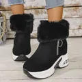 Close-up of black faux fur platform snow boots with side zipper and air cushion sole - 35 / Black