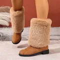 Stylish women's tan faux fur knee-high boots with a chunky heel and rounded toe - Brown