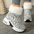 Women's leopard print snow boots with white faux fur and thick platform soles. - White Leopard