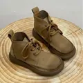 Retro brown leather lace-up desert boots with thick soles displayed on a rustic wood slab - 35 / Khaki Thin Lining