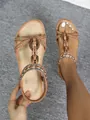 Bohemian flat sandals with braided straps and retro wooden buckle detail - 36 / Caramel color