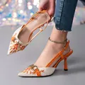 Elegant pointed toe slingback sandals featuring orange floral pattern and gold buckle - 36 / Orange and White