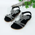 Bohemian flat sandals for women featuring sparkling rhinestone flower design and soft black sole - 35 / Black