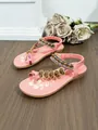 Stylish pink bohemian flat sandals with intricate beadwork and floral footbed pattern - 38 / Pink