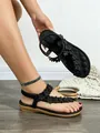 Elegant black Bohemian flat sandals featuring 3D floral accents and comfortable elastic straps - 38 / Black (D Style)