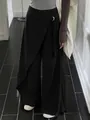 High-waisted black wide-leg trousers with asymmetrical wrap design and ring buckle. - S / Bottoms / Black