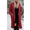 Close-up view of a long-sleeved warm burgundy plush teddy coat with lapels in snow - S / Tops / Red