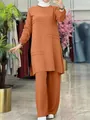Elegante set due pezzi arancione ruggine con tunica a maniche lunghe e pantaloni larghi - Taglia S / Top E Pantaloni / Arancione