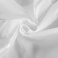 Detailed macro view showing the soft white cotton fabric texture of the asymmetric blouse - S / Tops / White