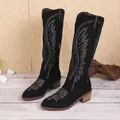Detailed studio shot of black embroidered mid-calf cowboy boots for women with V-neck - 36 / Black
