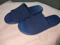 Close-up showing the navy blue knitted fabric texture on women's flat slide sandals - 36 / Blue