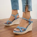 Close-up of denim wedge sandals with braided platform and ankle strap charm - 38 / Blue