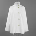 Elegant white mid-length trench coat with large amber buttons and high collar detail - S / Tops / White