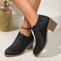 Women's black matte ankle boots with chunky block heels and side zippers on feet - 36 / Black