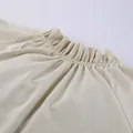 Close-up detail of the elegant ruffled neckline on a natural beige French linen dress - S / Dress (LYQ4301) / Khaki