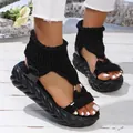 Stylish women's black woven chunky platform sandals featuring open toe and knit straps - 36 / Black