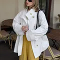 Elegant white mid-length trench coat with loose fit and marble buttons for chic women - S / Tops / White