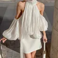 Κομψή λευκή γαλλική μπλούζα με λαιμόκοψη halter και πλισέ μανίκια φανάρι με έξω ώμους - S / Tops / Βερικοκί