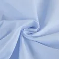 High-quality light blue cotton shirt fabric texture detail with elegant soft folds - S / Tops / Blue