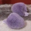 Luxury fluffy purple faux fur slippers for women, perfect for cozy winter indoor warmth. - Purple