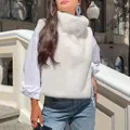 Stylish white faux fur sleeveless turtleneck vest for women in outdoor autumn setting - S / Tops / White